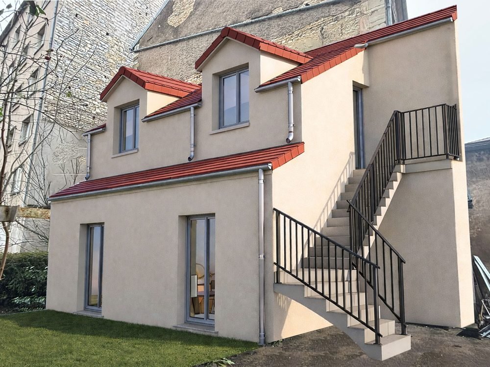 Remise transformée en deux logements, avec lucarnes et escalier extérieur